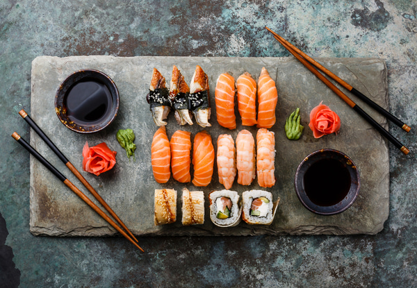 Sushi set served on stone slate