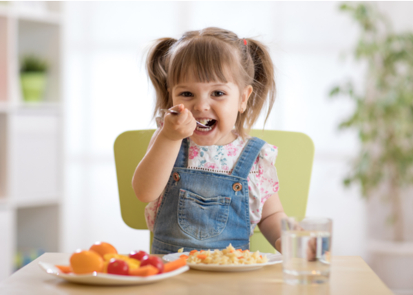 Infant eating healthy food